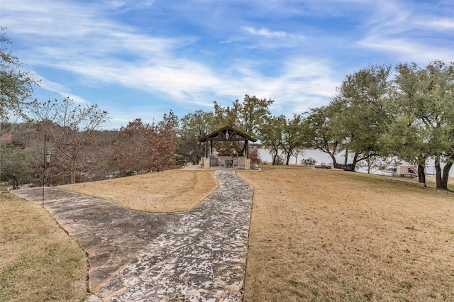 view of community featuring a gazebo and a lawn