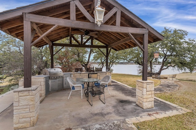 view of patio featuring area for grilling, a gazebo, and an outdoor kitchen