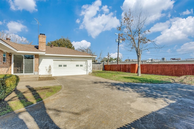 exterior space featuring a garage