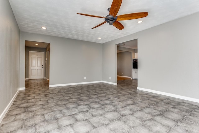 spare room featuring ceiling fan