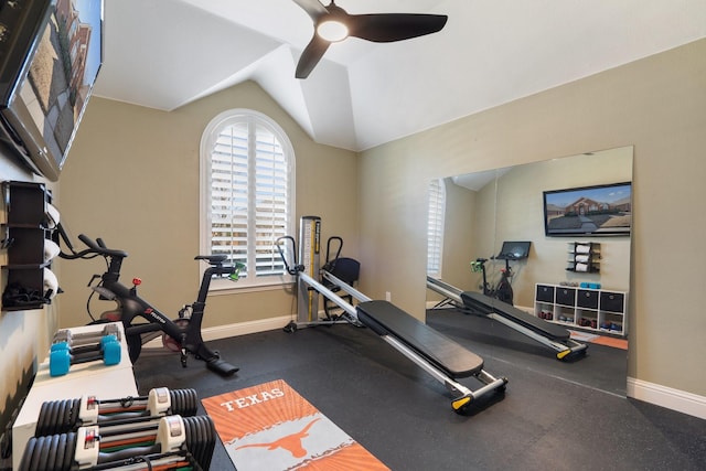 workout room featuring lofted ceiling and ceiling fan