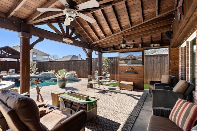 view of patio / terrace featuring an outdoor living space, a fenced in pool, and ceiling fan