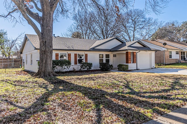 ranch-style home featuring a garage and a front yard