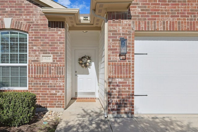 entrance to property featuring a garage