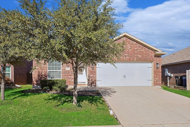 view of front of property with a garage and a front yard