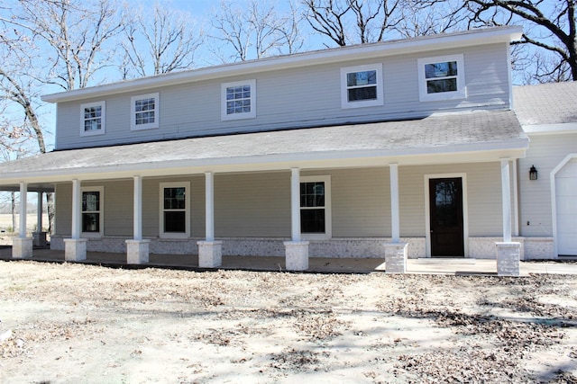 country-style home with covered porch