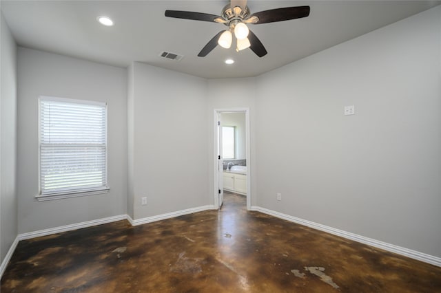 empty room featuring ceiling fan