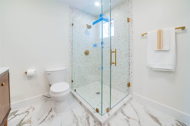 full bath featuring a stall shower, marble finish floor, vanity, and toilet