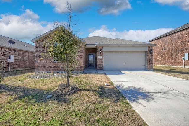 view of front of home with a garage and a front lawn