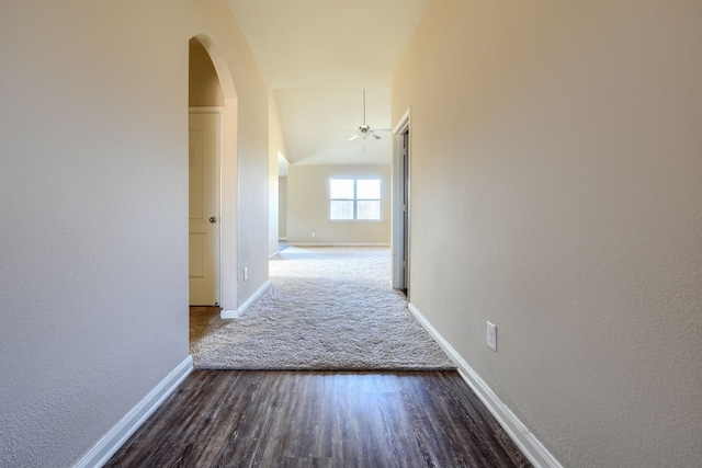 hallway featuring dark wood-type flooring