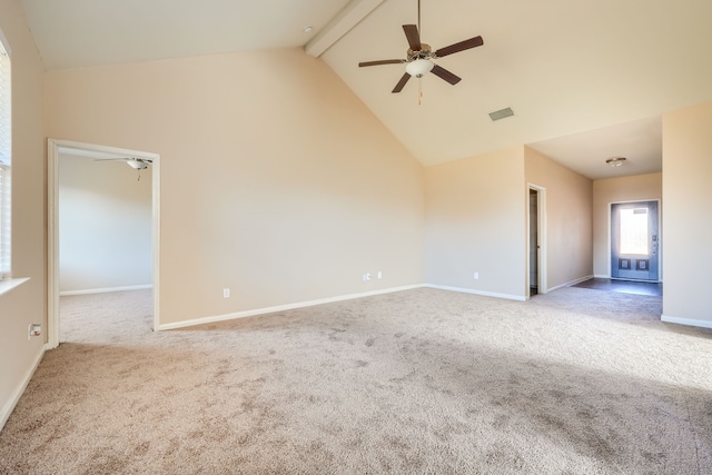 carpeted spare room with ceiling fan, high vaulted ceiling, and beam ceiling