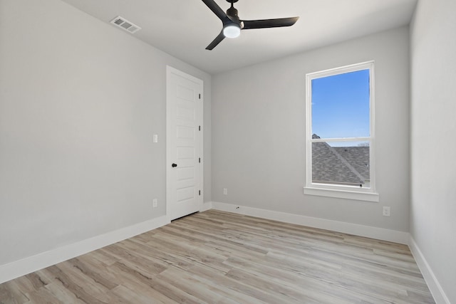 empty room featuring light hardwood / wood-style floors and ceiling fan