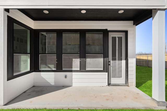 doorway to property featuring a patio