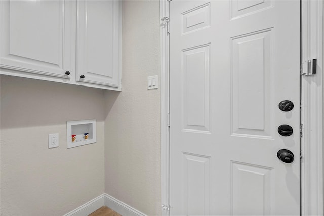 laundry area with cabinets and washer hookup