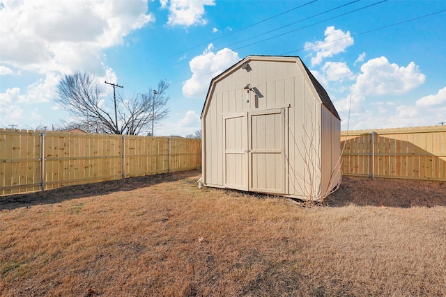 view of outbuilding with a lawn