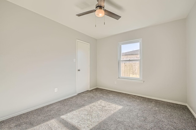 unfurnished room featuring carpet and ceiling fan