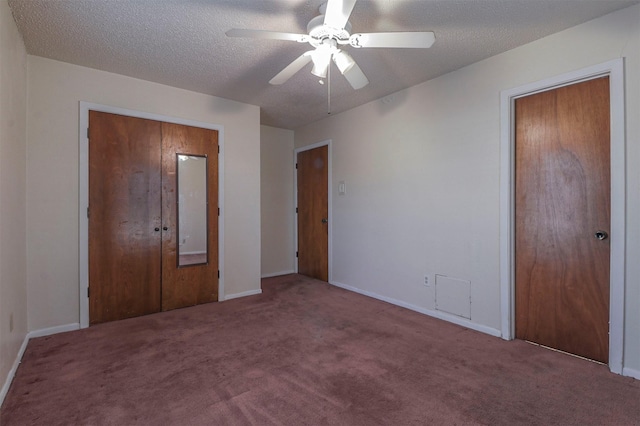 unfurnished bedroom with light colored carpet, a textured ceiling, and ceiling fan