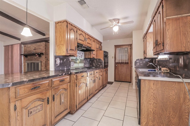 kitchen with decorative light fixtures, light tile patterned floors, ceiling fan, and decorative backsplash