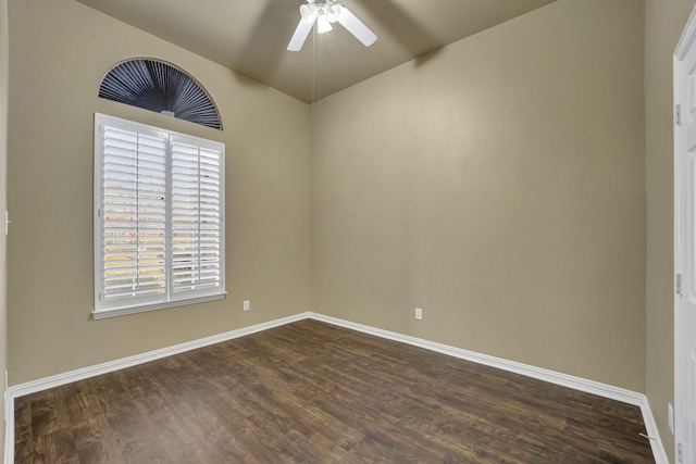 empty room with dark wood-type flooring and ceiling fan