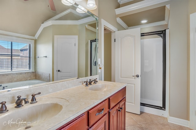 bathroom featuring lofted ceiling, vanity, ornamental molding, tile patterned floors, and independent shower and bath