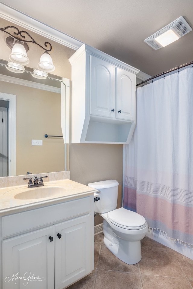 bathroom featuring tile patterned floors, toilet, ornamental molding, vanity, and a shower with shower curtain