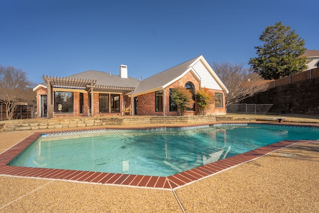 view of swimming pool with a pergola and a patio