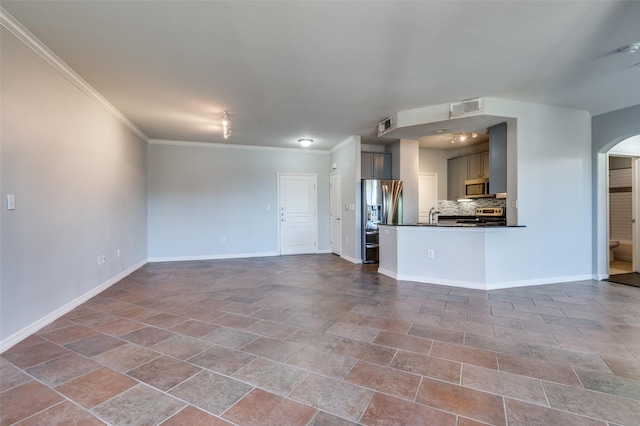 unfurnished living room featuring ornamental molding and sink