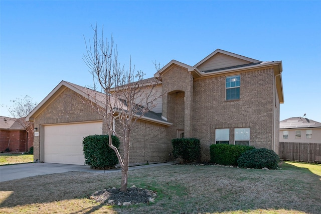 view of front property with a garage and a front yard