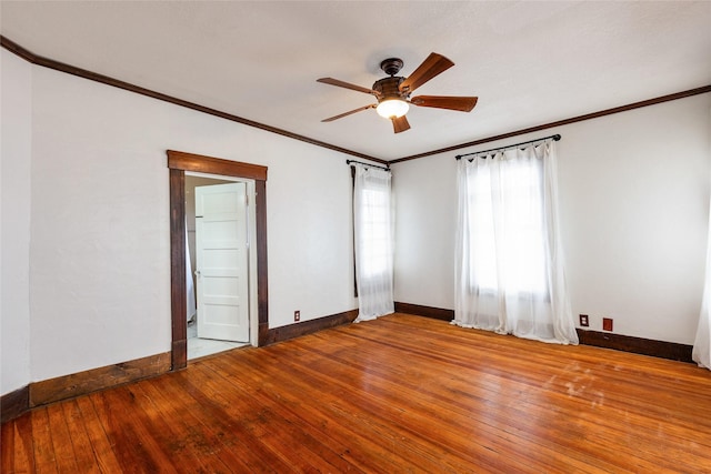 unfurnished room featuring ornamental molding, ceiling fan, and light hardwood / wood-style floors