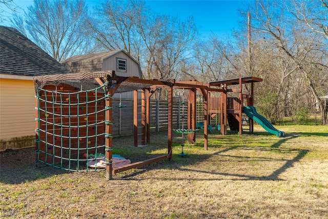 view of playground with a lawn