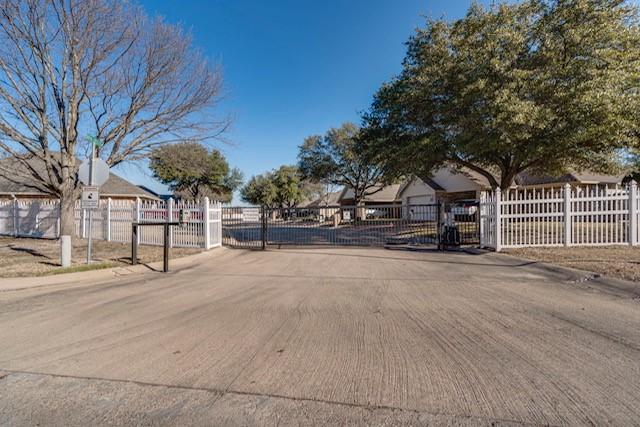 ranch-style home with a carport