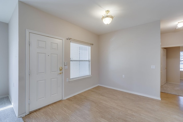 112 Royal Crest Ct, Red Oak, TX 75154 - kitchen with light wood finished floors, light countertops, a wealth of natural light, and appliances with stainless steel finishes