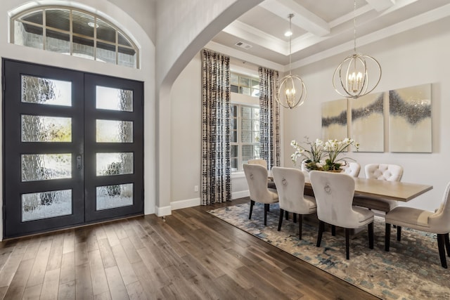 foyer featuring a high ceiling, crown molding, coffered ceiling, and dark hardwood / wood-style floors