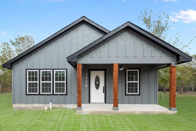 modern inspired farmhouse with a front yard