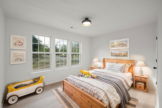 bedroom featuring light wood-type flooring