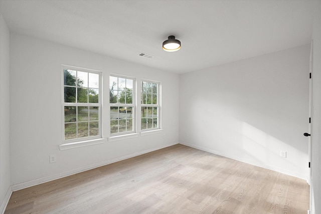 empty room featuring light hardwood / wood-style floors