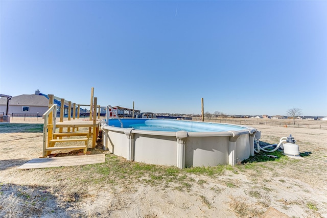 view of pool featuring a rural view