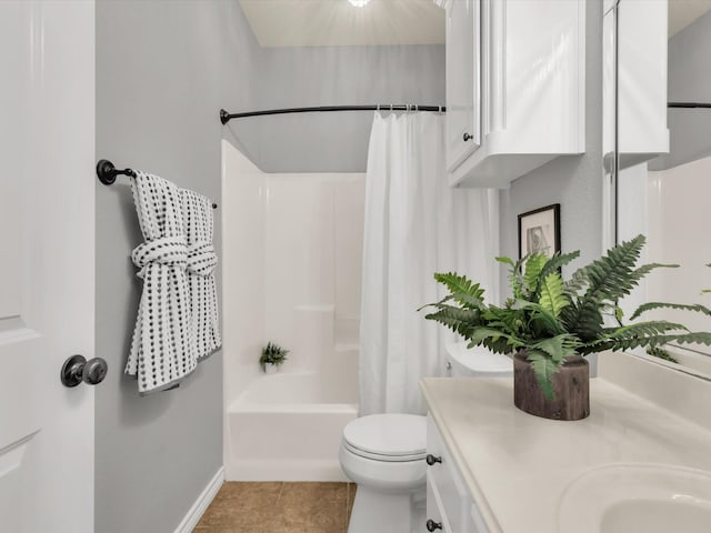 bathroom featuring baseboards, toilet, tile patterned floors, shower / bath combination with curtain, and vanity