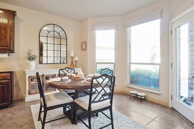 dining room with light tile patterned floors