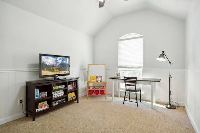 office featuring ceiling fan, vaulted ceiling, and carpet