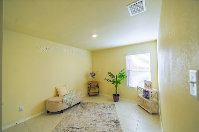 sitting room with light tile patterned flooring