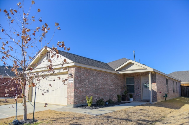 ranch-style home featuring a garage