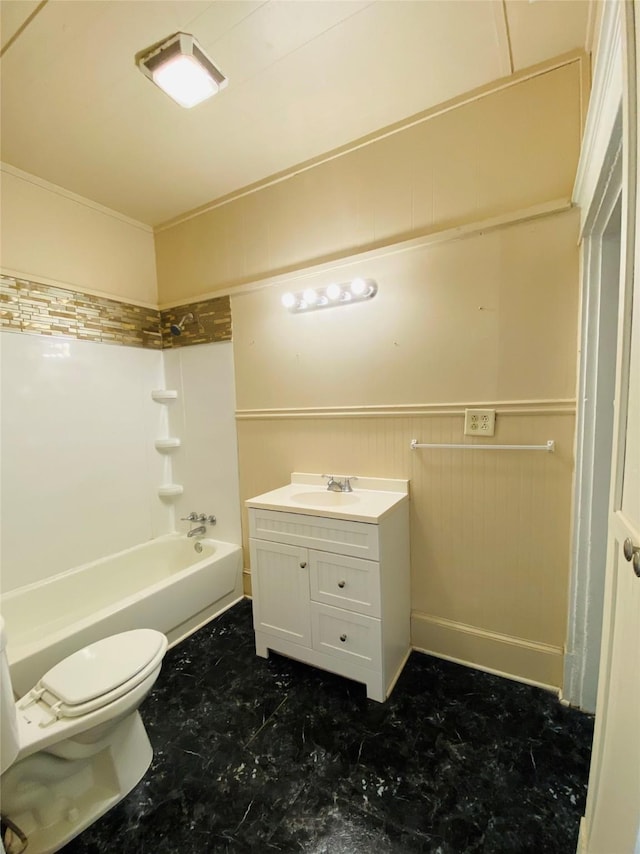 full bathroom featuring vanity, ornamental molding, toilet, and shower / bath combination