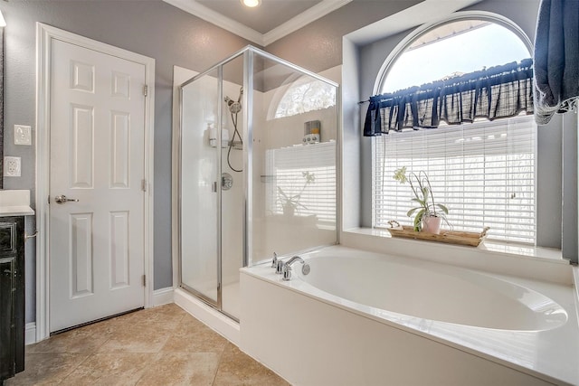 bathroom with tile patterned flooring, ornamental molding, and shower with separate bathtub