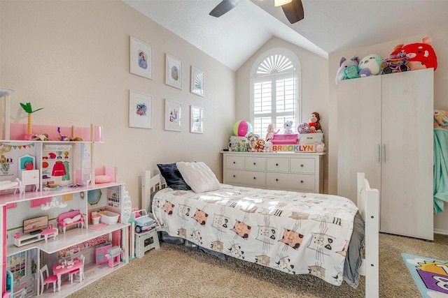 bedroom with lofted ceiling, carpet, and ceiling fan