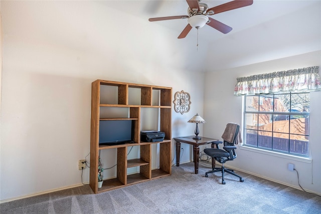 carpeted home office with ceiling fan