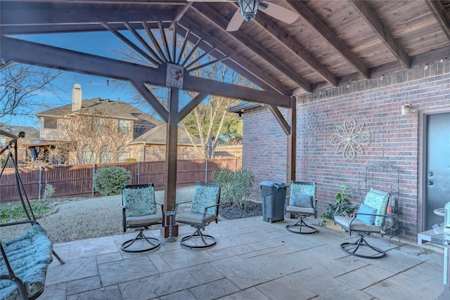 view of patio with ceiling fan