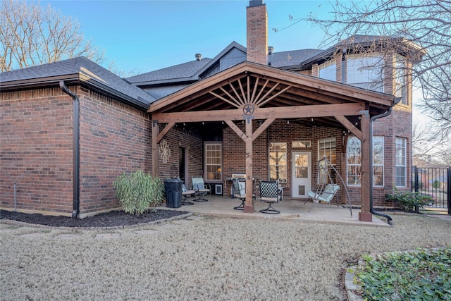 rear view of house with a patio area