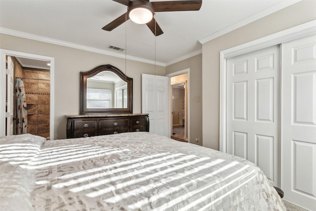 bedroom featuring crown molding, a closet, and ceiling fan