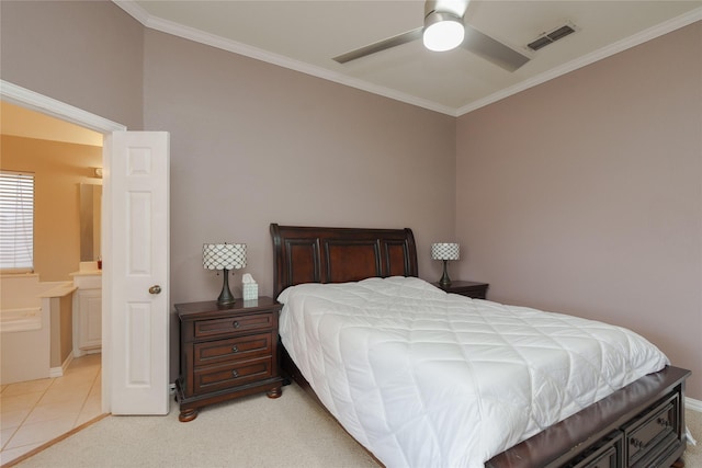 bedroom featuring ensuite bathroom, light tile patterned floors, and ceiling fan